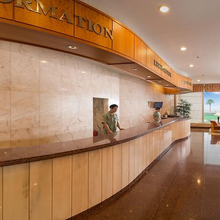 Seogwipo Kal Hotel Exterior photo Reception desk at a hotel