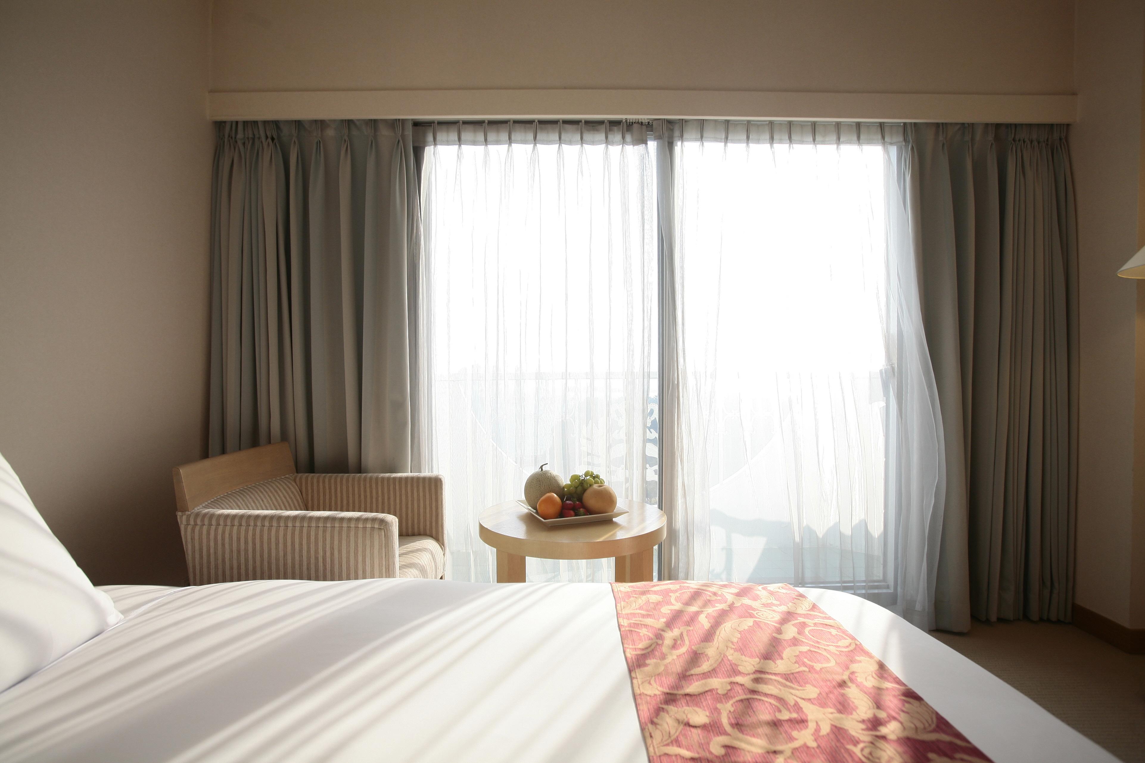 Seogwipo Kal Hotel Exterior photo A bedroom at the hotel